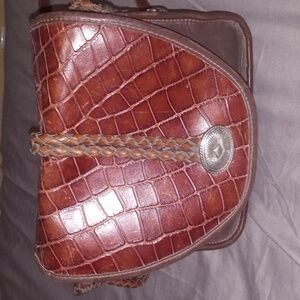 Brown leather crossbody purse with inside and outside pocket